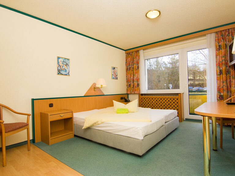 Das zweite, separate Zimmer im Typ V Familienappartement, das zusätzlichen Schlaf- und Spielraum für den Familienurlaub Thüringen bietet.